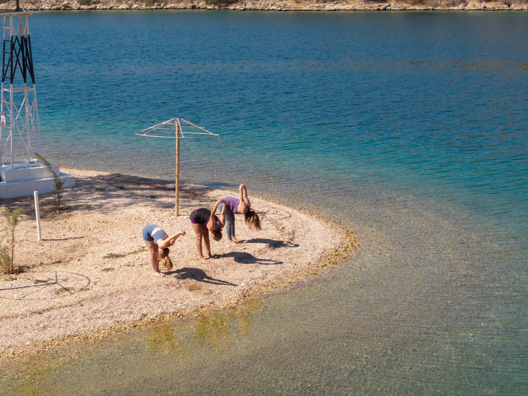 Yoga on the shoreline in Evia, Greece